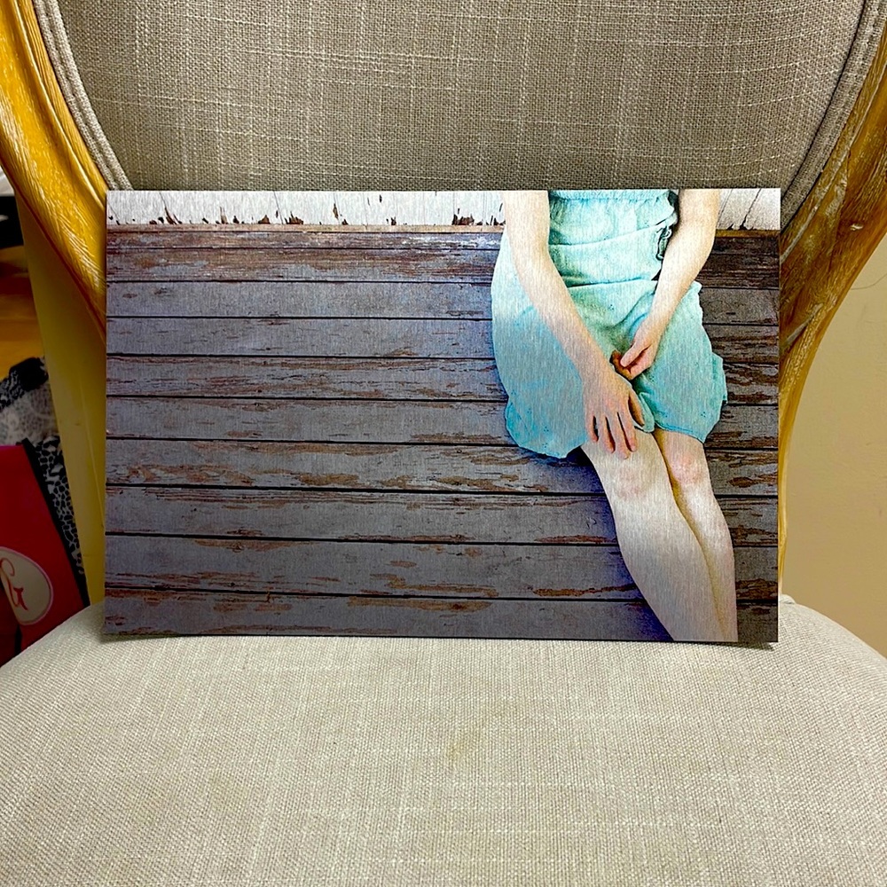 Artwork of Young Girl Sitting On Bench